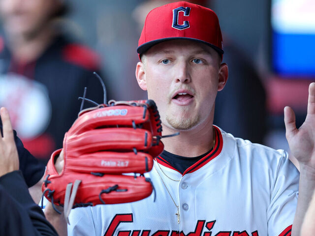 CLEVELAND, OH - AUGUST 26: Cleveland Guardians starting pitcher Parker Messick (77) is congratulated in the Cleveland Guardians dugout following the third inning of the Major League Baseball game between the Tampa Bay Rays and Cleveland Guardians on August 26, 2025, at Progressive Field in Cleveland, OH.