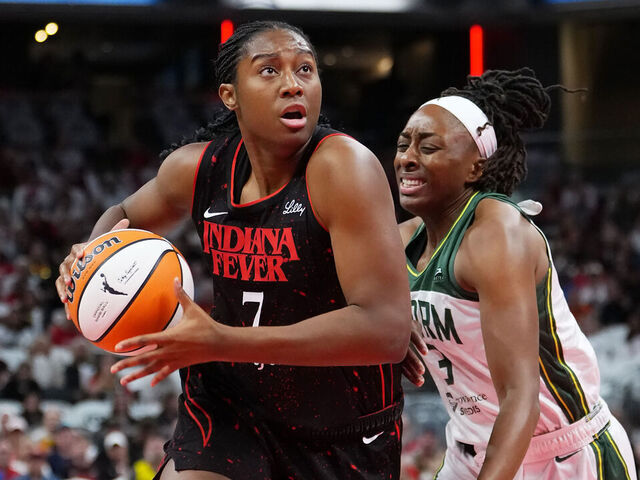INDIANAPOLIS, INDIANA - AUGUST 26: Aliyah Boston #7 of the Indiana Fever dribbles the ball while being guarded by Nneka Ogwumike #3 of the Seattle Storm in the first quarter at Gainbridge Fieldhouse on August 26, 2025 in Indianapolis, Indiana.
