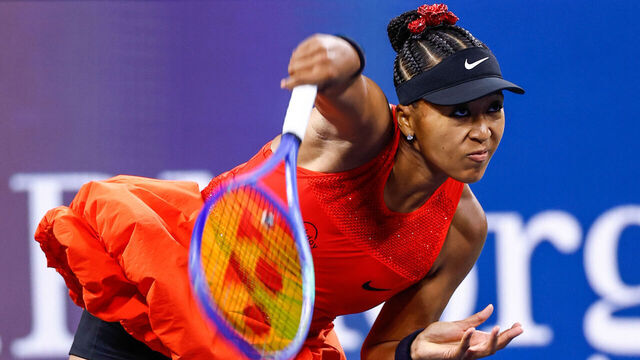 Japan's Naomi Osaka serves the ball to Belgium's Greet Minnen during their women's singles first round tennis match on day three of the US Open tennis tournament at the USTA Billie Jean King National Tennis Center in New York City, on August 26, 2025.