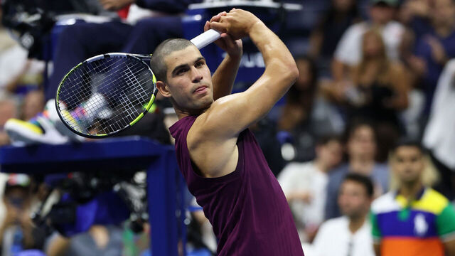 NEW YORK, NEW YORK - AUGUST 25: Carlos Alcaraz of Spain celebrates with a golf swing after defeating Reilly Opelka of the United States during their Men's Singles First Round match on Day Two of the 2025 US Open at USTA Billie Jean King National Tennis Center on August 25, 2025 in the Flushing neighborhood of the Queens borough of New York City.