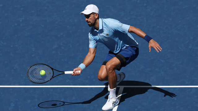 NEW YORK, NEW YORK - AUGUST 27: Novak Djokovic of Serbia returns against Zachary Svajda of the United States during their Men's Singles Second Round match on Day Four of the 2025 US Open at USTA Billie Jean King National Tennis Center on August 27, 2025 in the Flushing neighborhood of the Queens borough of New York City.