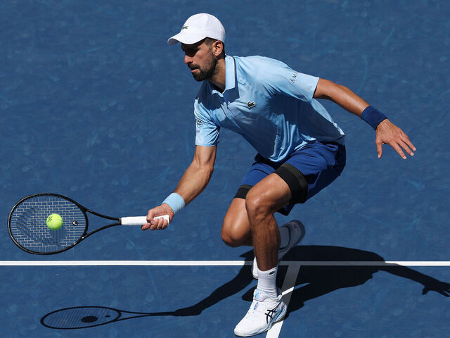 NEW YORK, NEW YORK - AUGUST 27: Novak Djokovic of Serbia returns against Zachary Svajda of the United States during their Men's Singles Second Round match on Day Four of the 2025 US Open at USTA Billie Jean King National Tennis Center on August 27, 2025 in the Flushing neighborhood of the Queens borough of New York City.