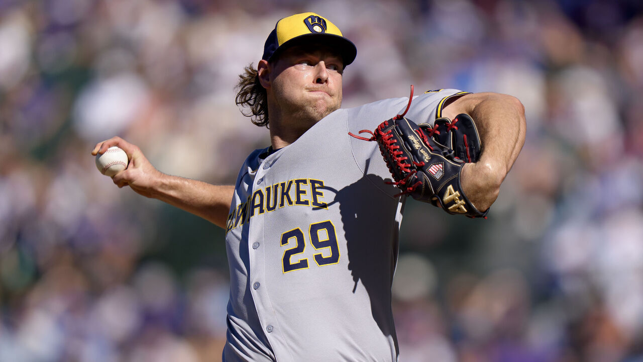 CHICAGO, ILLINOIS - AUGUST 21: Trevor Megill #29 of the Milwaukee Brewers pitches in a game against the Chicago Cubs at Wrigley Field on August 21, 2025 in Chicago, Illinois.