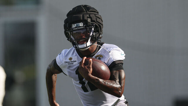 JACKSONVILLE, FLORIDA - AUGUST 11: Travis Hunter #12 of the Jacksonville Jaguars practices during Training Camp at Miller Electric Center on August 11, 2025 in Jacksonville, Florida.