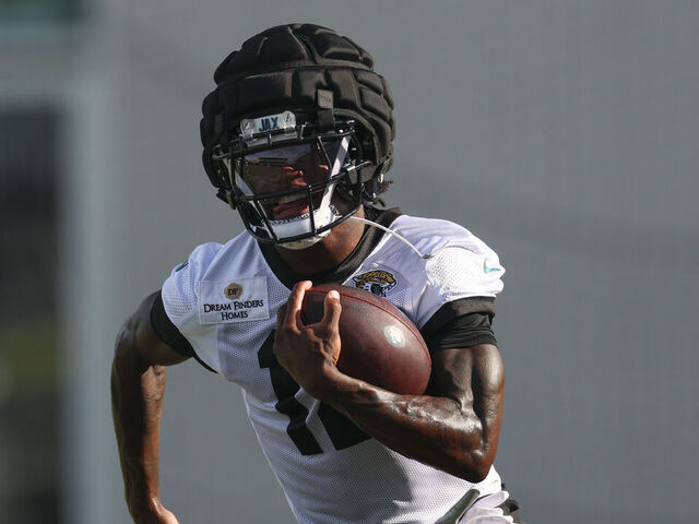 JACKSONVILLE, FLORIDA - AUGUST 11: Travis Hunter #12 of the Jacksonville Jaguars practices during Training Camp at Miller Electric Center on August 11, 2025 in Jacksonville, Florida.