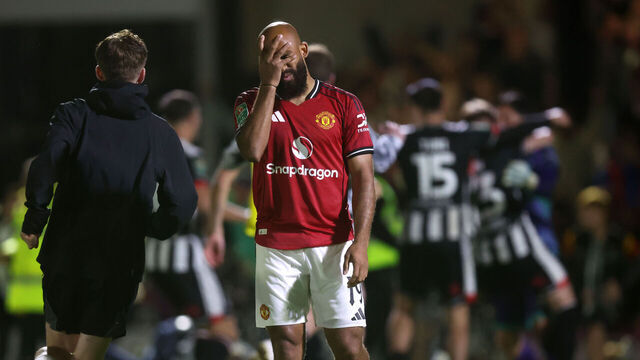 GRIMSBY, ENGLAND - AUGUST 27: Bryan Mbeumo of Manchester United looks dejected after missing his teams thirteenth penalty during the Carabao Cup Second Round match between Grimsby Town and Manchester United at Blundell Park on August 27, 2025 in Grimsby, England.