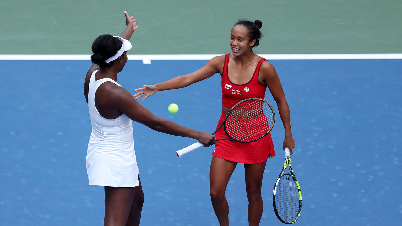 NEW YORK, NEW YORK - AUGUST 28: Venus Williams of the United States (L) and Leylah Fernandez of Canada celebrate after winning match point of their Women's Doubles First Round match against Lyudmyla Kichenok of Ukraine and Ellen Perez of Australia on Day Five of the 2025 US Open at USTA Billie Jean King National Tennis Center on August 28, 2025 in the Flushing neighborhood of the Queens borough of New York City.