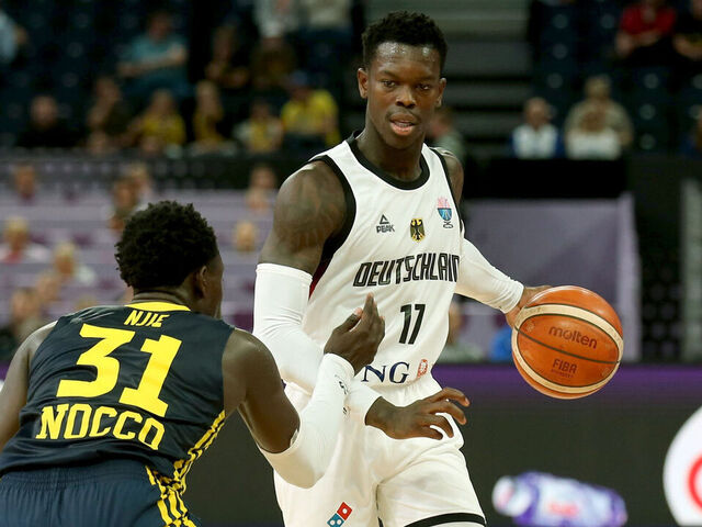 29 August 2025, Finland, Tampere: Basketball: European Championship, Germany - Sweden, preliminary round, group B, match day 2, Dennis Schroeder (Germany, 17) against Barra Njie (Sweden, 31) Photo: Matthias Stickel/dpa