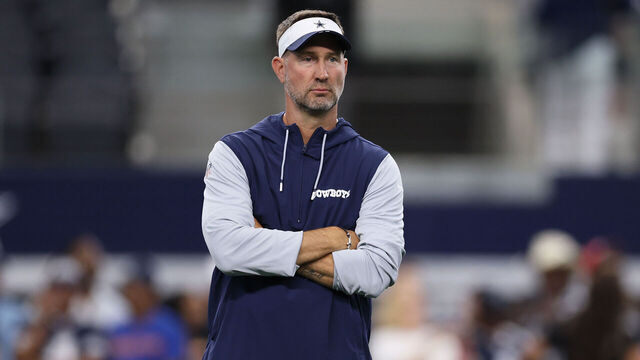 ARLINGTON, TEXAS - AUGUST 16: Dallas Cowboys head coach Brian Schottenheimer looks on prior to the NFL Preseason 2025 game against the Baltimore Ravens at AT&T Stadium on August 16, 2025 in Arlington, Texas.