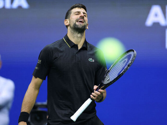 Serbia's Novak Djokovic reacts during his men's singles third round match against Britain's Cameron Norrie on day six of the US Open tennis tournament at the USTA Billie Jean King National Tennis Center in New York City on August 29, 2025.