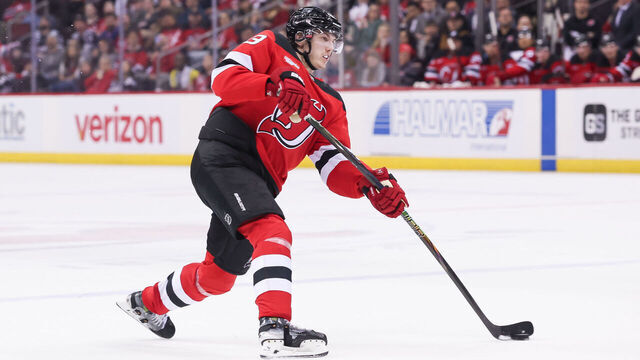 NEWARK, NJ - MARCH 31: New Jersey Devils defenseman Luke Hughes (43) takes a shot during a NHL game between the Minnesota Wild and New Jersey Devils at Prudential Center on March 31, 2025 in Newark, New Jersey.