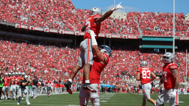 COLUMBUS, OH - AUGUST 30: Ohio State Buckeyes running back CJ Donaldson (12) reacts after scoring a touchdown during the game against the Texas Longhorns and the Ohio State Buckeyes on August 30, 2025, at Ohio Stadium in Columbus, OH.