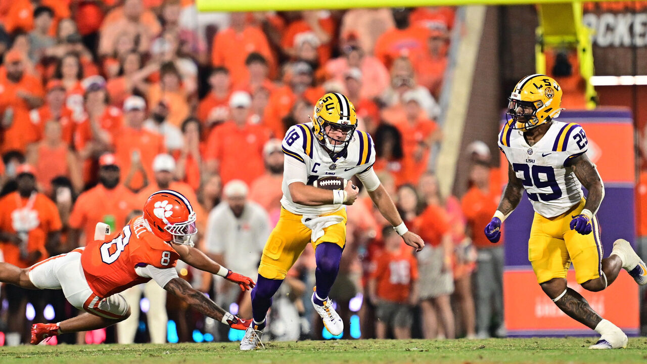 CLEMSON, SC - AUGUST 30: Garrett Nussmeier #18 of the LSU Tigers runs for a first down during the second quarter against the Clemson Tigers on August 30, 2025 at Memorial Stadium in Clemson, South Carolina.