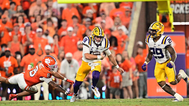 CLEMSON, SC - AUGUST 30: Garrett Nussmeier #18 of the LSU Tigers runs for a first down during the second quarter against the Clemson Tigers on August 30, 2025 at Memorial Stadium in Clemson, South Carolina.