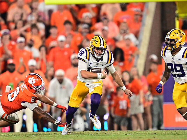 CLEMSON, SC - AUGUST 30: Garrett Nussmeier #18 of the LSU Tigers runs for a first down during the second quarter against the Clemson Tigers on August 30, 2025 at Memorial Stadium in Clemson, South Carolina.