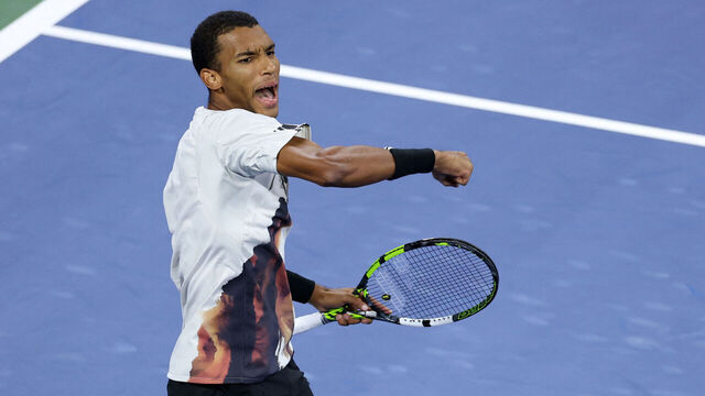 Canada's Felix Auger-Aliassime celebrates winning the third set against Germany's Alexander Zverev during their men's singles third round match on day seven of the US Open tennis tournament at the USTA Billie Jean King National Tennis Center in New York City, on August 30, 2025.