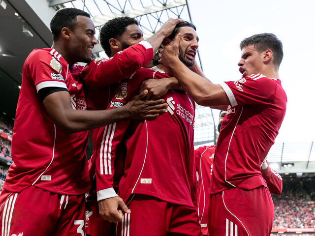 LIVERPOOL, ENGLAND - AUGUST 31: Dominik Szoboszlai of Liverpool celebrates with his teammates after scoring his sides first goal to make it 1 - 0 during the Premier League match between Liverpool and Arsenal at Anfield on August 31, 2025 in Liverpool, England.