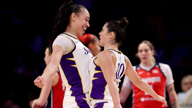 LOS ANGELES, CALIFORNIA - AUGUST 31: Dearica Hamby #5 and Kelsey Plum #10 of the Los Angeles Sparks celebrate a basket and a foul during the fourth quarter against the Washington Mystics at Crypto.com Arena on August 31, 2025 in Los Angeles, California.