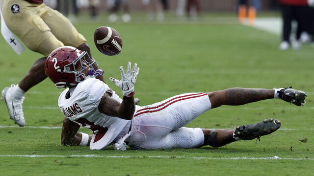 TALLAHASSEE, FLORIDA - AUGUST 30: Ryan Williams #2 of the Alabama Crimson Tide bobbles the ball as he tries to make a catch against the Florida State Seminoles during the third quarter of a football game at Doak Campbell Stadium on August 30, 2025 in Tallahassee, Florida.
