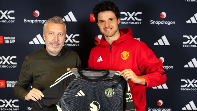MANCHESTER, ENGLAND - SEPTEMBER 01: (EXCLUSIVE COVERAGE) Senne Lammens of Manchester United poses with Director of Football Jason Wilcox after signing for the club at Carrington Training Ground on September 01, 2025 in Manchester, England.