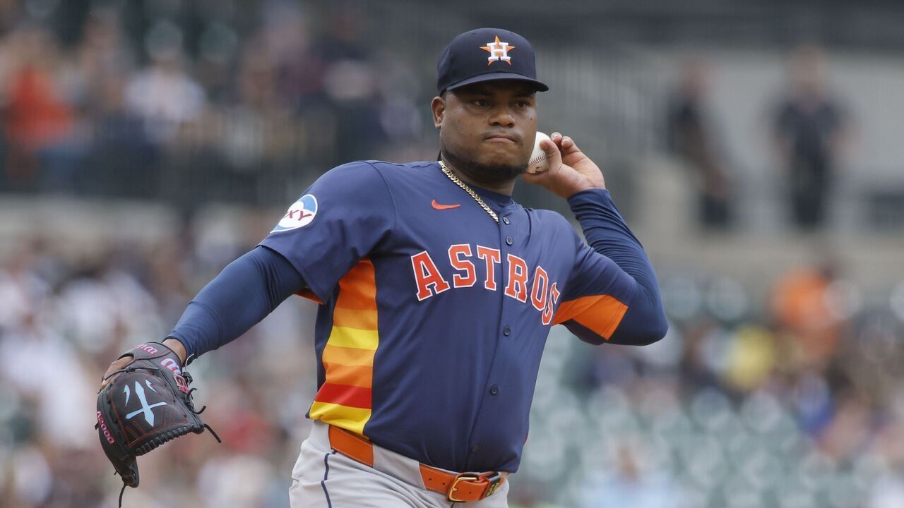 DETROIT, MI - AUGUST 20: Pitcher Framber Valdez #59 of the Houston Astros throws to first base against the Detroit Tigers during the first inning at Comerica Park on August 20, 2025 in Detroit, Michigan.