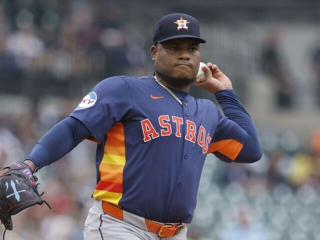 DETROIT, MI - AUGUST 20: Pitcher Framber Valdez #59 of the Houston Astros throws to first base against the Detroit Tigers during the first inning at Comerica Park on August 20, 2025 in Detroit, Michigan.