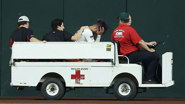 PHOENIX, ARIZONA - SEPTEMBER 01: Outfielder Lourdes Gurriel Jr. #12 of the Arizona Diamondbacks leaves the game after a collision with Blaze Alexander (not pictured) during the sixth inning of the MLB game against the Texas Rangers at Chase Field on September 01, 2025 in Phoenix, Arizona.
