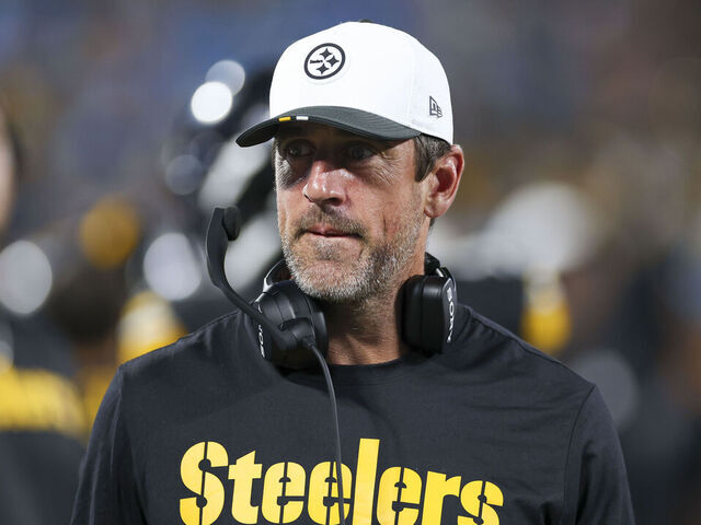 CHARLOTTE, NORTH CAROLINA - AUGUST 21: Aaron Rodgers #8 of the Pittsburgh Steelers looks on from the sidelines during a NFL Preseason 2025 game against the Carolina Panthers at Bank of America Stadium on August 21, 2025 in Charlotte, North Carolina.