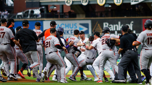 DENVER, CO - SEPTEMBER 2: The San Francisco Giants and Colorado Rockies fight on the field after a verbal altercation between Kyle Freeland #21 of the Colorado Rockies and Rafael Devers #16 of the San Francisco Giants after Devers hit a two run home run in the first inning at Coors Field on September 2, 2025 in Denver, Colorado.