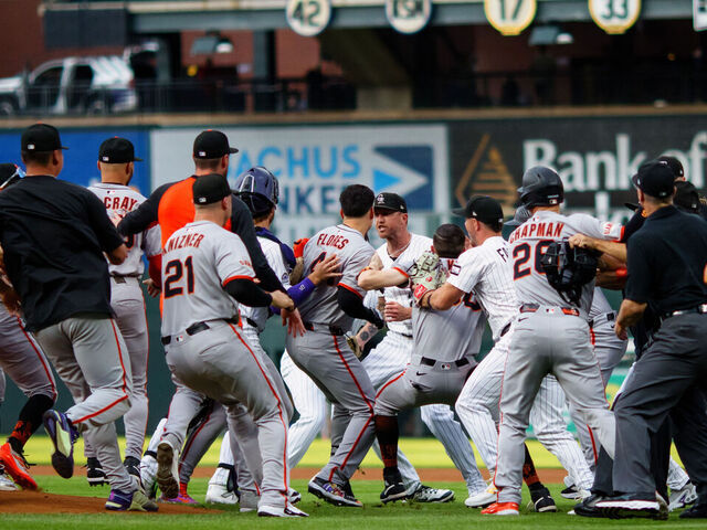 DENVER, CO - SEPTEMBER 2: The San Francisco Giants and Colorado Rockies fight on the field after a verbal altercation between Kyle Freeland #21 of the Colorado Rockies and Rafael Devers #16 of the San Francisco Giants after Devers hit a two run home run in the first inning at Coors Field on September 2, 2025 in Denver, Colorado.