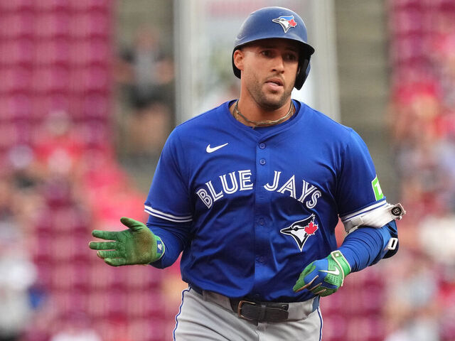 CINCINNATI, OHIO - SEPTEMBER 02: George Springer #4 of the Toronto Blue Jays celebrates a solo home run as he runs the bases during the first inning against the Cincinnati Reds at Great American Ball Park on September 02, 2025 in Cincinnati, Ohio.