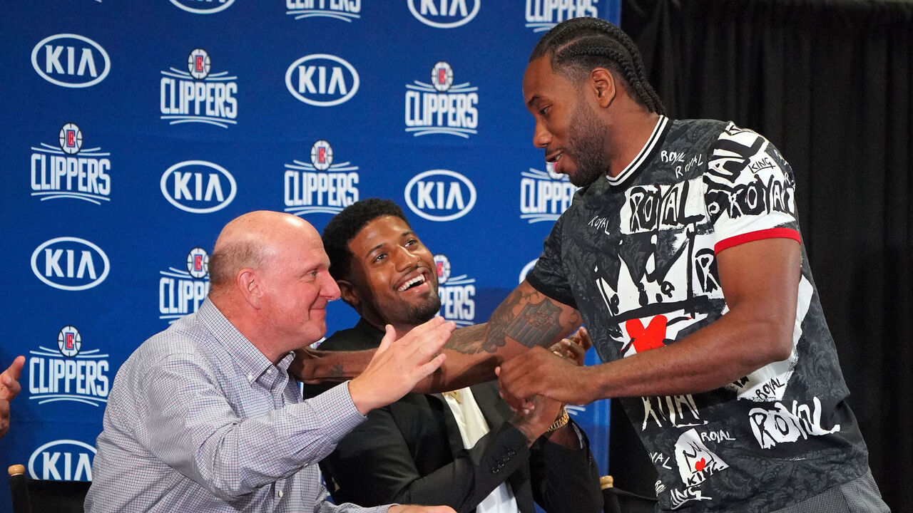 LOS ANGELES, CA - JULY 24: From left, Clippers owner Steve Ballmer, Paul George and Kawhi Leonard during a press conference at the Green Meadows Recreation Center in Los Angeles on Wednesday, July 24, 2019. George and Leonard were introduced to the media and fans as the newest members of the Clippers.