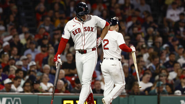 BOSTON, MA - SEPTEMBER 2: Roman Anthony #19 of the Boston Red Sox holds his lower back after swinging and missing at a third strike during the fourth inning at Fenway Park on September 2, 2025 in Boston, Massachusetts.