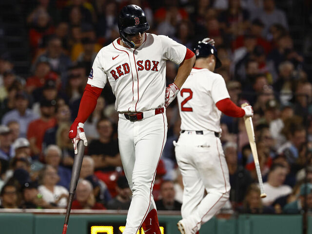 BOSTON, MA - SEPTEMBER 2: Roman Anthony #19 of the Boston Red Sox holds his lower back after swinging and missing at a third strike during the fourth inning at Fenway Park on September 2, 2025 in Boston, Massachusetts.