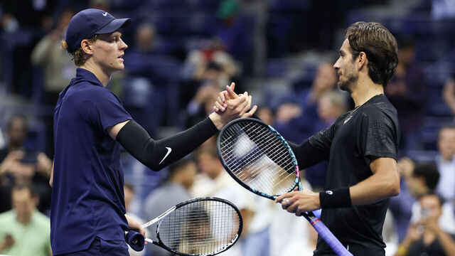 NEW YORK, NEW YORK - SEPTEMBER 03: Lorenzo Musetti (R) of Italy shakes hands with Jannik Sinner of Italy after his defeat in the Men's Quarterfinal match on Day Eleven of the 2025 US Open at USTA Billie Jean King National Tennis Center on September 3, 2025 in the Flushing neighborhood of the Queens borough of New York City.