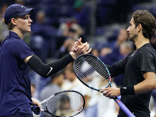 NEW YORK, NEW YORK - SEPTEMBER 03: Lorenzo Musetti (R) of Italy shakes hands with Jannik Sinner of Italy after his defeat in the Men's Quarterfinal match on Day Eleven of the 2025 US Open at USTA Billie Jean King National Tennis Center on September 3, 2025 in the Flushing neighborhood of the Queens borough of New York City.