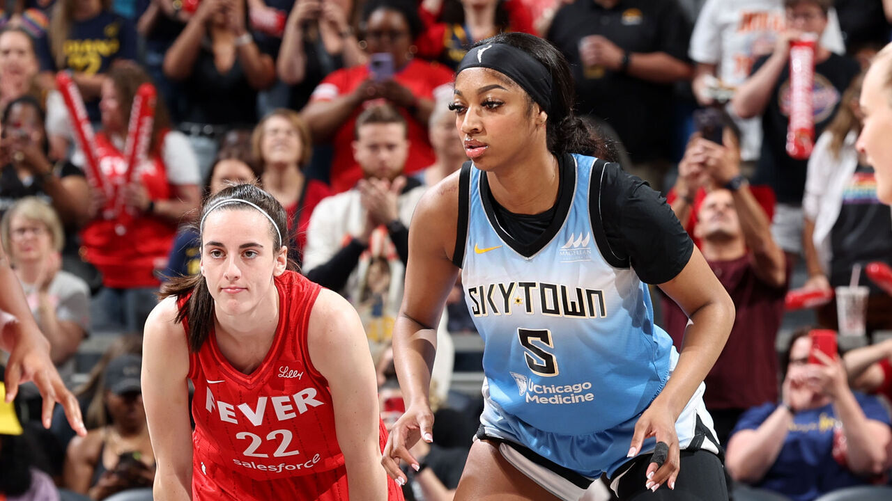 INDIANAPOLIS, IN - JUNE 1: Caitlin Clark #22 of the Indiana Fever and Angel Reese #5 of the Chicago Sky look on during the game on June 1, 2024 at Gainbridge Fieldhouse in Indianapolis, Indiana. Mandatory Copyright Notice: Copyright 2024 NBAE