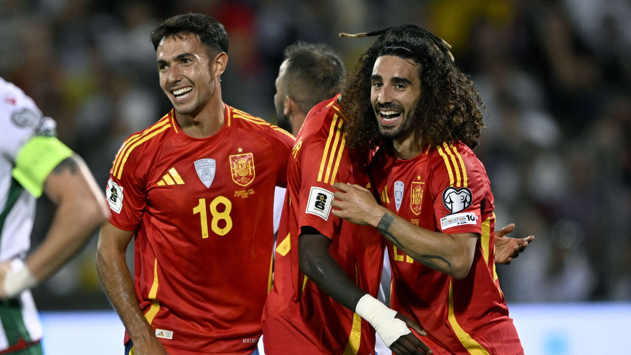 Spain's defender #22 Marc Cucurella (R) celebrates with teammates Spain's midfielder #18 Martin Zubimendi and Spain's midfielder #17 Nico Williams after he scored the team's second goal during the FIFA World Cup 2026 Group E European qualification football matches between Bulgaria and Spain, at the Vassil Levski stadium in Sofia on September 4, 2025.