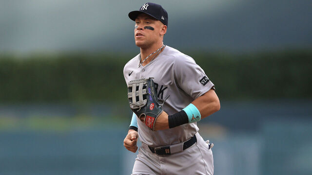 ATLANTA, GA - JULY 18: Aaron Judge #99 of the New York Yankees trots in from the outfield during the Friday evening MLB game between the Atlanta Braves and the New York Yankees on July 18, 2025 at Truist Park in Atlanta, Georgia.