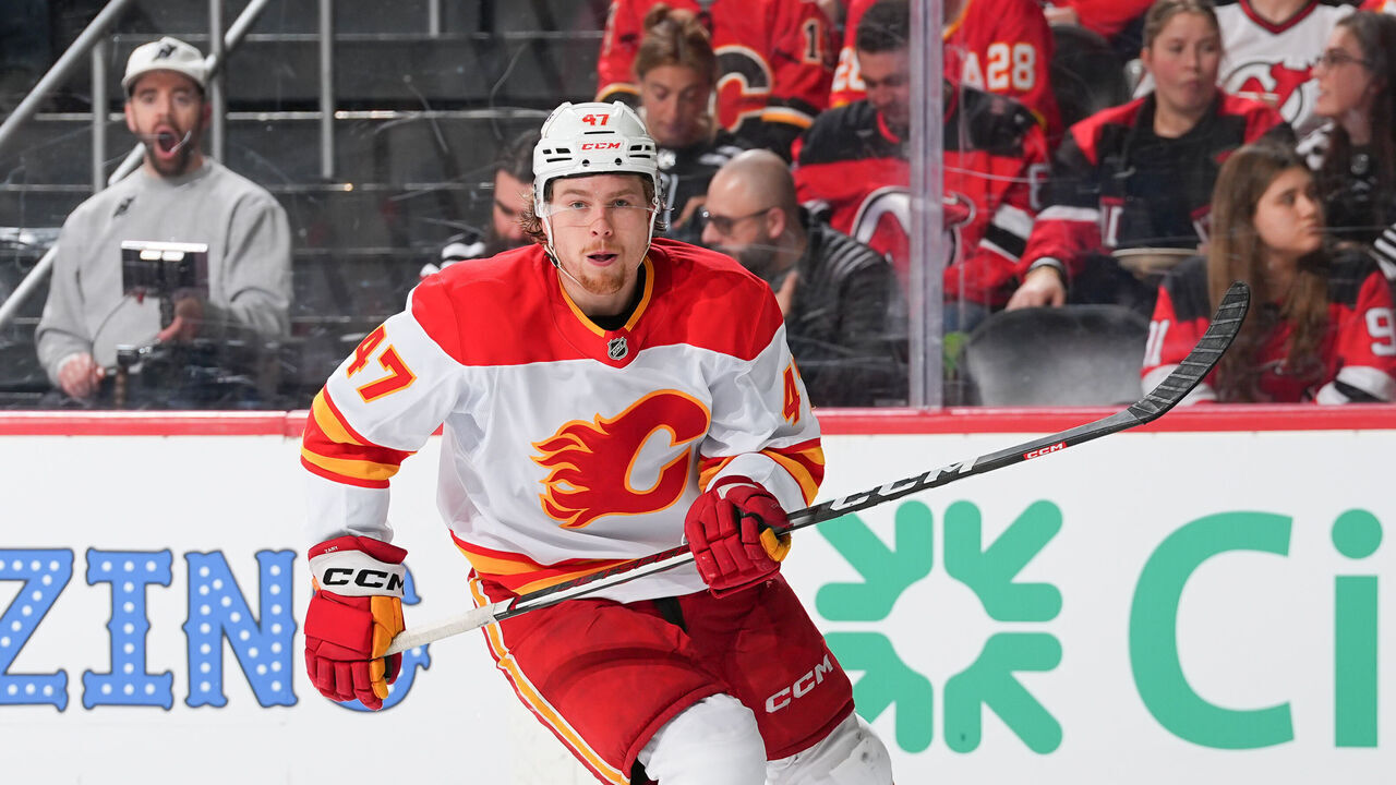 NEWARK, NJ - MARCH 20: Connor Zary #47 of the Calgary Flames skates during the game against the New Jersey Devils at the Prudential Center on March 20, 2025 in Newark, New Jersey.