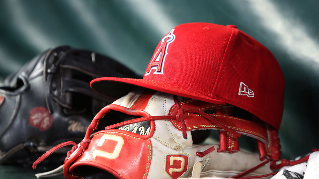 ATLANTA, GA - JULY 02: A general view of the Los Angeles Angels baseball cap sits in the dugout during the MLB game between the Los Angeles Angels and the Atlanta Braves on July 02, 2025 at TRUIST Park in Atlanta, GA.