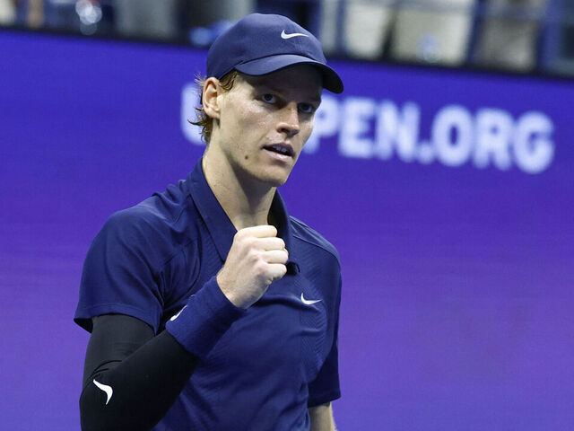 Italy's Jannik Sinner celebrates after victory over Canada's Felix Auger-Aliassime during their men's singles semifinal tennis match on day thirteen of the US Open tennis tournament at the USTA Billie Jean King National Tennis Center in New York City, on September 5, 2025.