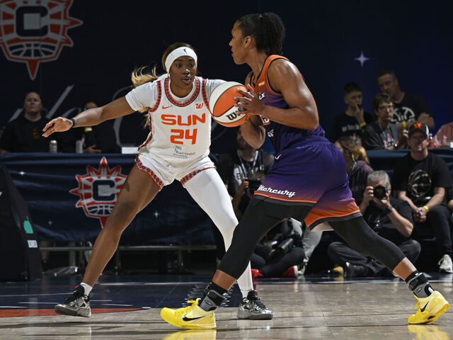 UNCASVILLE, CT - SEPTEMBER 6: Aneesah Morrow #24 of the Connecticut Sun plays defense during the game against Alyssa Thomas #25 of the Phoenix Mercury on September 6, 2025 at the Mohegan Sun Arena in Uncasville, Connecticut. Mandatory Copyright Notice: Copyright 2025 NBAE