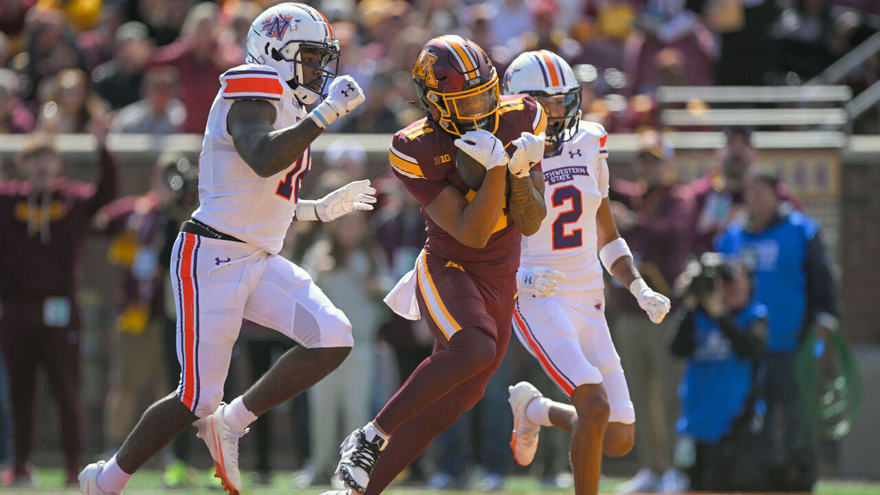 MINNEAPOLIS, MN - SEPTEMBER 06: Minnesota Golden Gophers wide receiver Fame Ijeboi (11) catches a 22-yard pass for a touchdown as Northwestern State Demons defensive back Pierre Goree (22) and Northwestern State Demons defensive back Antonio Hall (2) give chase during the second quarter of a college football game between the Minnesota Golden Gophers and Northwestern State Demons on September 6, 2025, at Huntington Bank Stadium in Minneapolis, MN.