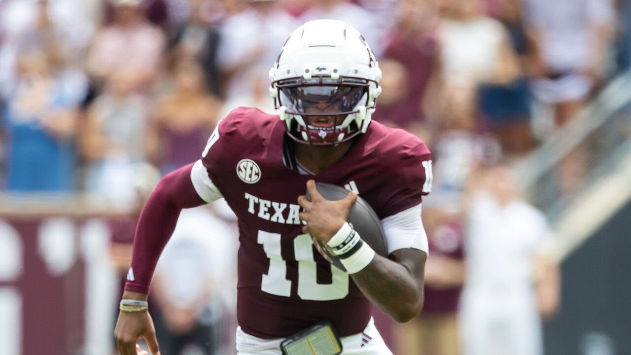 COLLEGE STATION, TEXAS - SEPTEMBER 06: Marcel Reed #10 of the Texas A&M Aggies runs the ball in the first half against the Utah State Aggies at Kyle Field on September 06, 2025 in College Station, Texas.