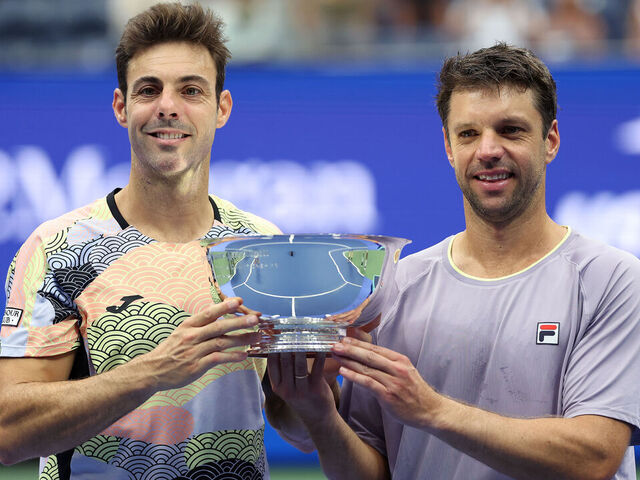NEW YORK, NEW YORK - SEPTEMBER 06: (L-R) Marcel Granollers of Spain and Horacio Zeballos of Argentina pose with their trophies after defeating Neal Skupski of the United Kingdom and Joe Salisbury of the United Kingdom during their Men's Doubles Final match on Day Fourteen of the 2025 US Open at USTA Billie Jean King National Tennis Center on September 06, 2025 in New York City.