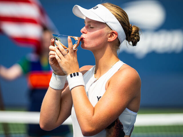 NEW YORK, NEW YORK - SEPTEMBER 06: Jeline Vandromme of Belgium poses with the champions trophy after defeating Lea Nilsson of Sweden in the Girls Juniors final on Day 14 of the US Open at USTA Billie Jean King National Tennis Center on September 06, 2025 in New York City