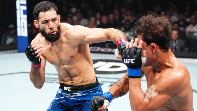PARIS, FRANCE - SEPTEMBER 06: (L-R) Nassourdine Imavov of Russia punches Caio Borralho of Brazil in their middleweight fight during the UFC Fight Night event at The Accor Arena on September 06, 2025 in Paris, France.