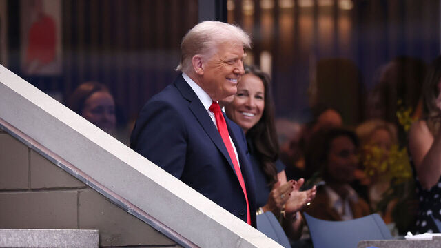 NEW YORK, NEW YORK - SEPTEMBER 07: U.S. President Donald Trump reacts as he arrives in the Rolex suite prior to the Men's Singles Final match between Jannik Sinner of Italy and Carlos Alcaraz of Spain on Day Fifteen of the 2025 US Open at USTA Billie Jean King National Tennis Center on September 07, 2025 in New York City.