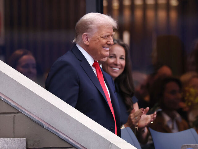 NEW YORK, NEW YORK - SEPTEMBER 07: U.S. President Donald Trump reacts as he arrives in the Rolex suite prior to the Men's Singles Final match between Jannik Sinner of Italy and Carlos Alcaraz of Spain on Day Fifteen of the 2025 US Open at USTA Billie Jean King National Tennis Center on September 07, 2025 in New York City.